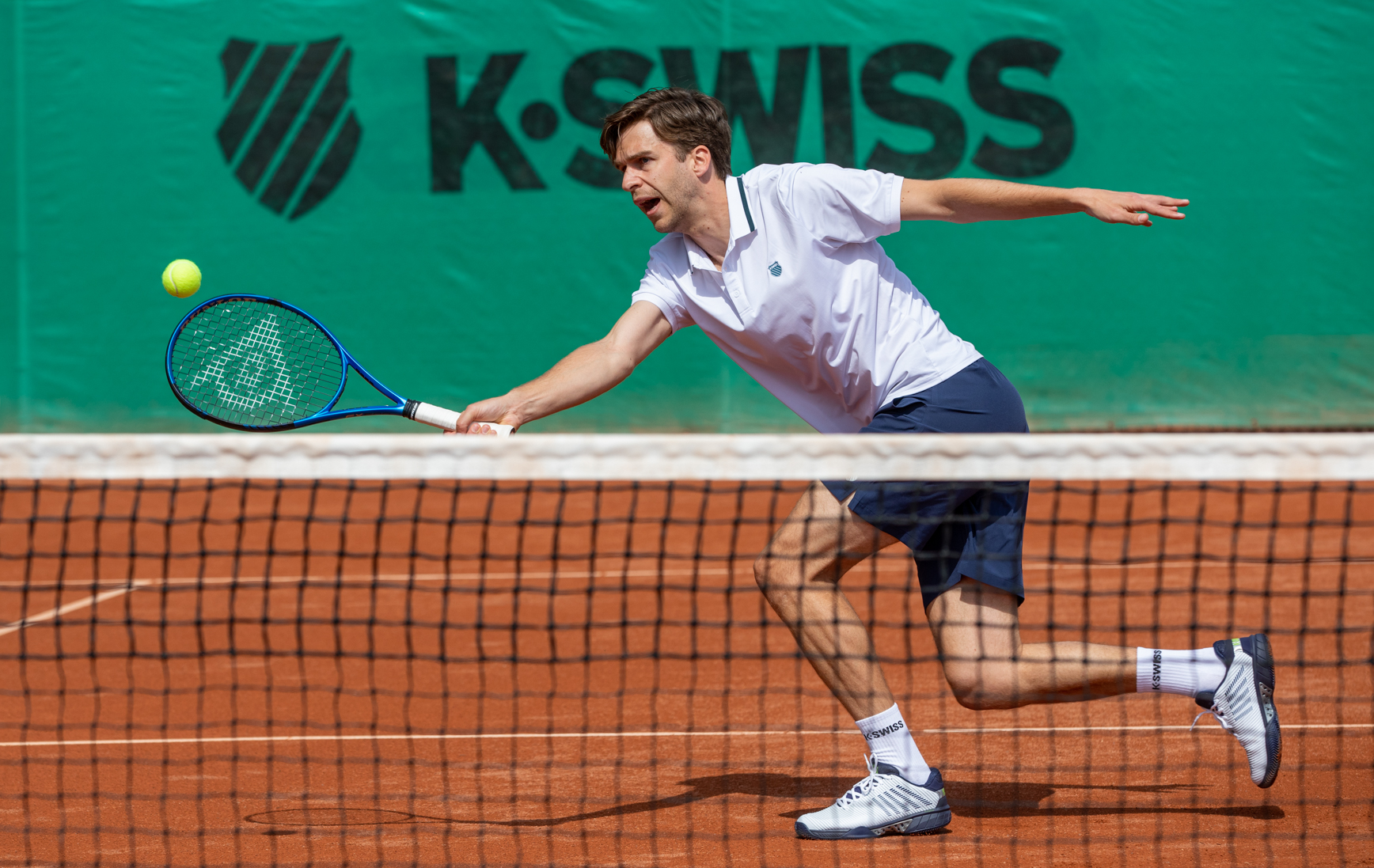 Tenniskleding en dunlopracket