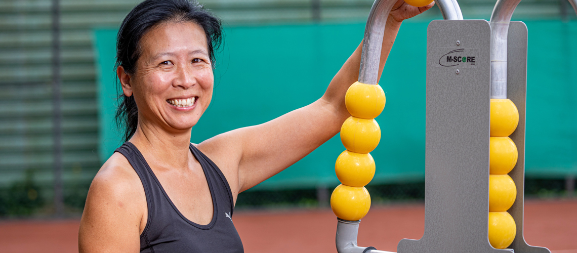 Mei Ling bij scorebord